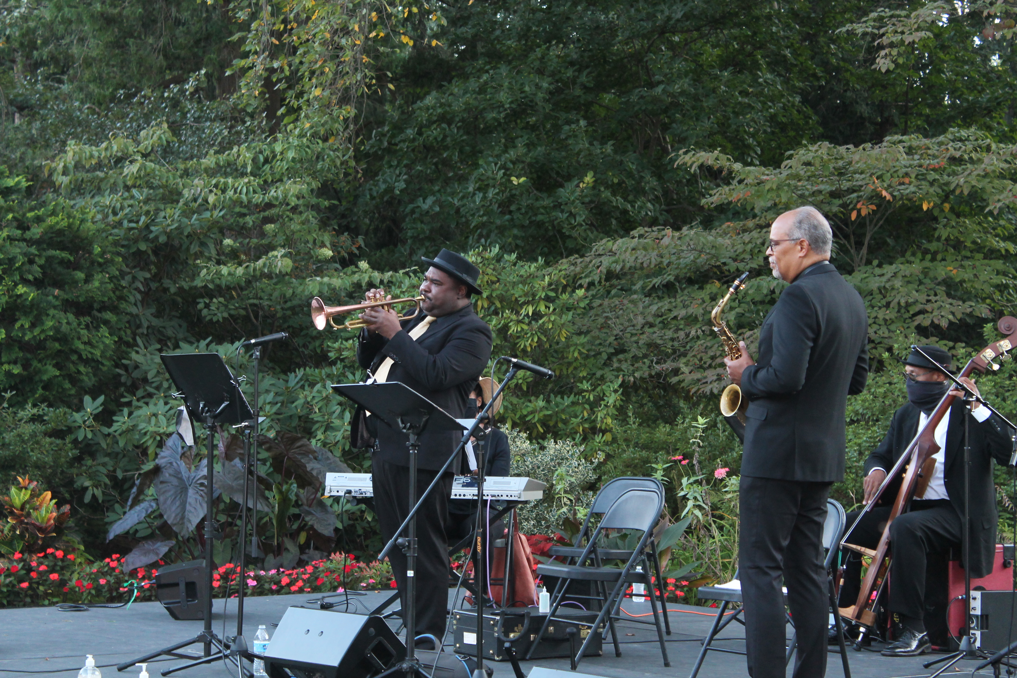 A trumpet player on stage at Jazz in the Gardens at Hillwood.