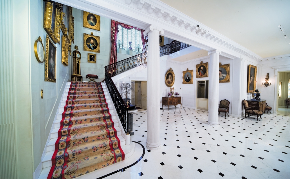 View of grand staircase in entry hall at Hillwood Estate, Museum & Gardens
