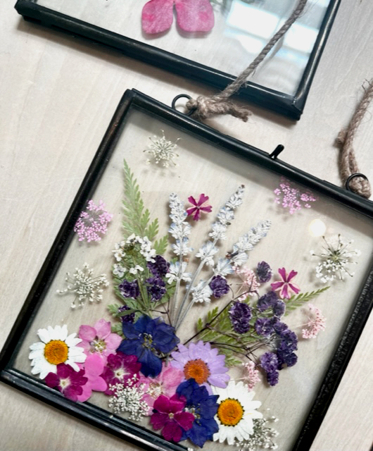 Pressed flowers in glass