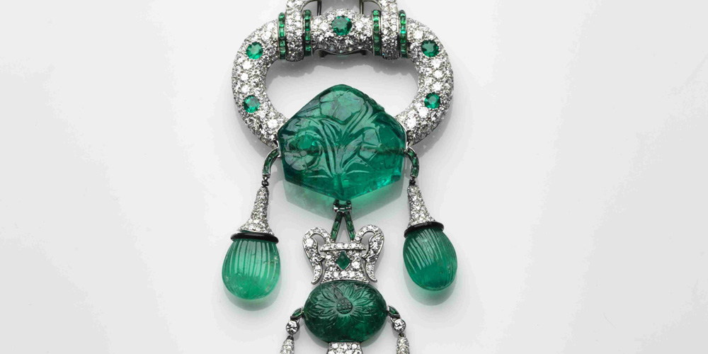 Detail of Marjorie Post's Islamic-inspired emerald brooch by Cartier
