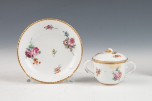 COVERED CUP AND SAUCER FROM CHEST