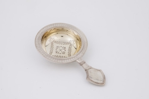 TEA STRAINER FROM A TEA AND COFFEE SERVICE