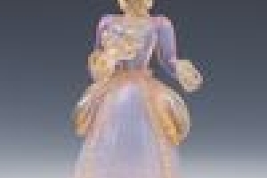 STATUETTE OF WOMAN, ONE OF TWO