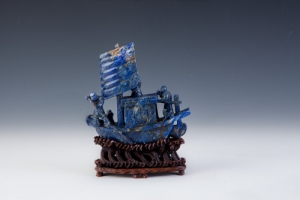 FIGURINE OF A RIVERBOAT