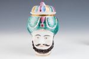 COVERED MUG IN THE SHAPE OF A TURK'S HEAD