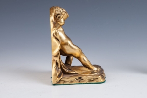 BOOKEND IN THE FORM OF CUPID, ONE OF TWO
